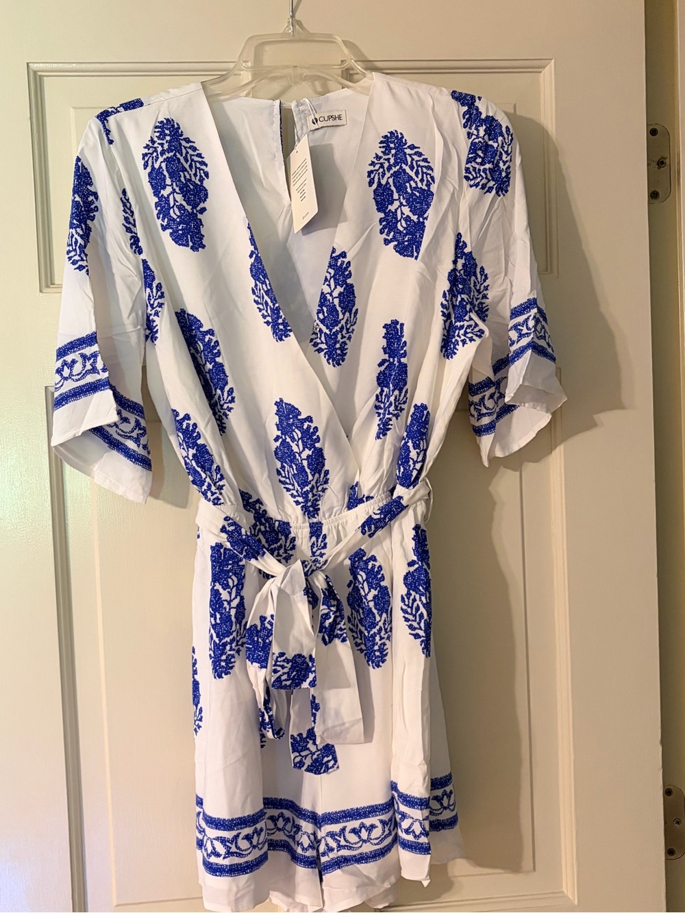 Cupshe White with Blue Floral Print shorts jumper with elastic waist and belt
